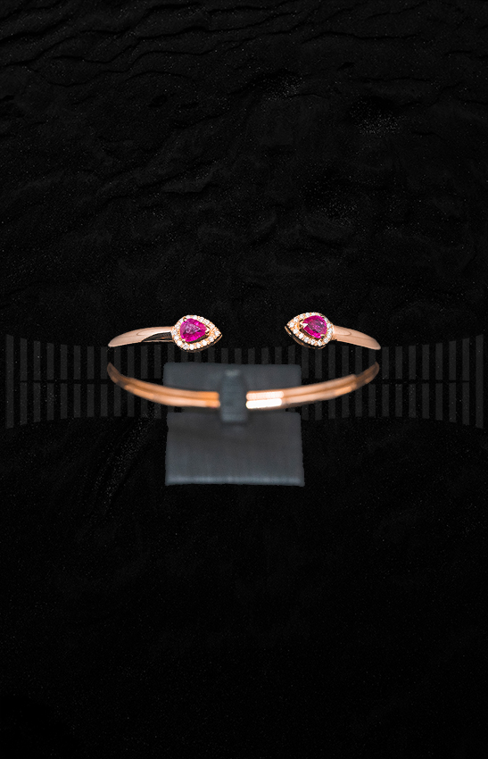 Pulsera Torques en Oro Rosa con Diamantes Brillantes y Rubí