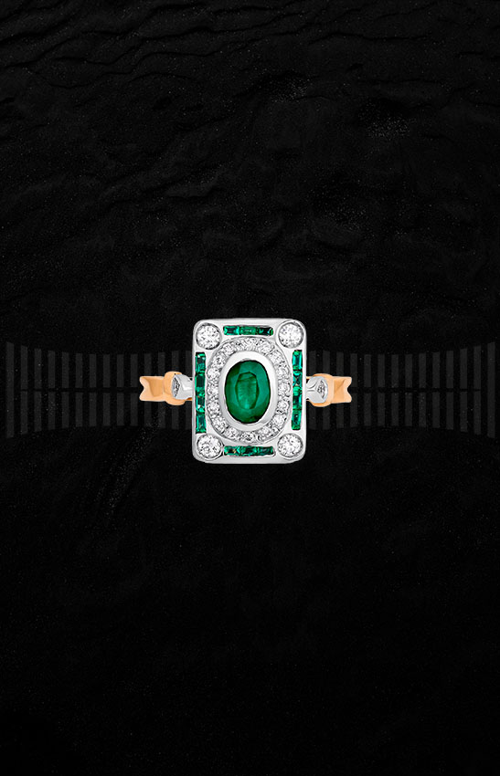 Anillo diseño art-decó en oro blanco y amarillo, esmeraldas y diamantes