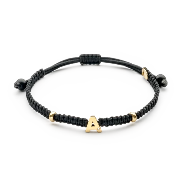 Colección Classics Letters, Diamante 0.01 ct, onix, letras