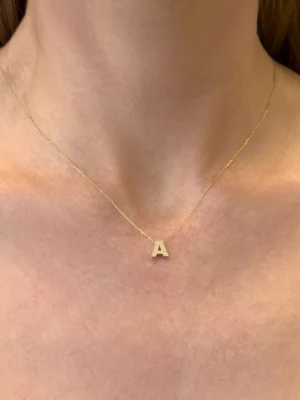 Colección Classics Letters, Diamante 0.01 ct, letras