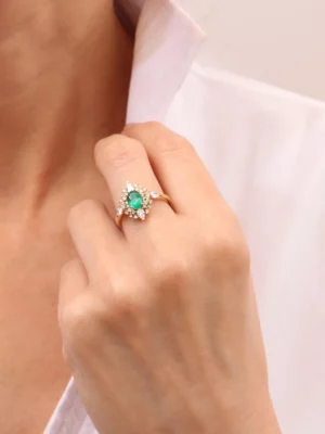 Colección Princess, Diamante 0.22 ct y diamante 0.42 ct, esmeralda, botón